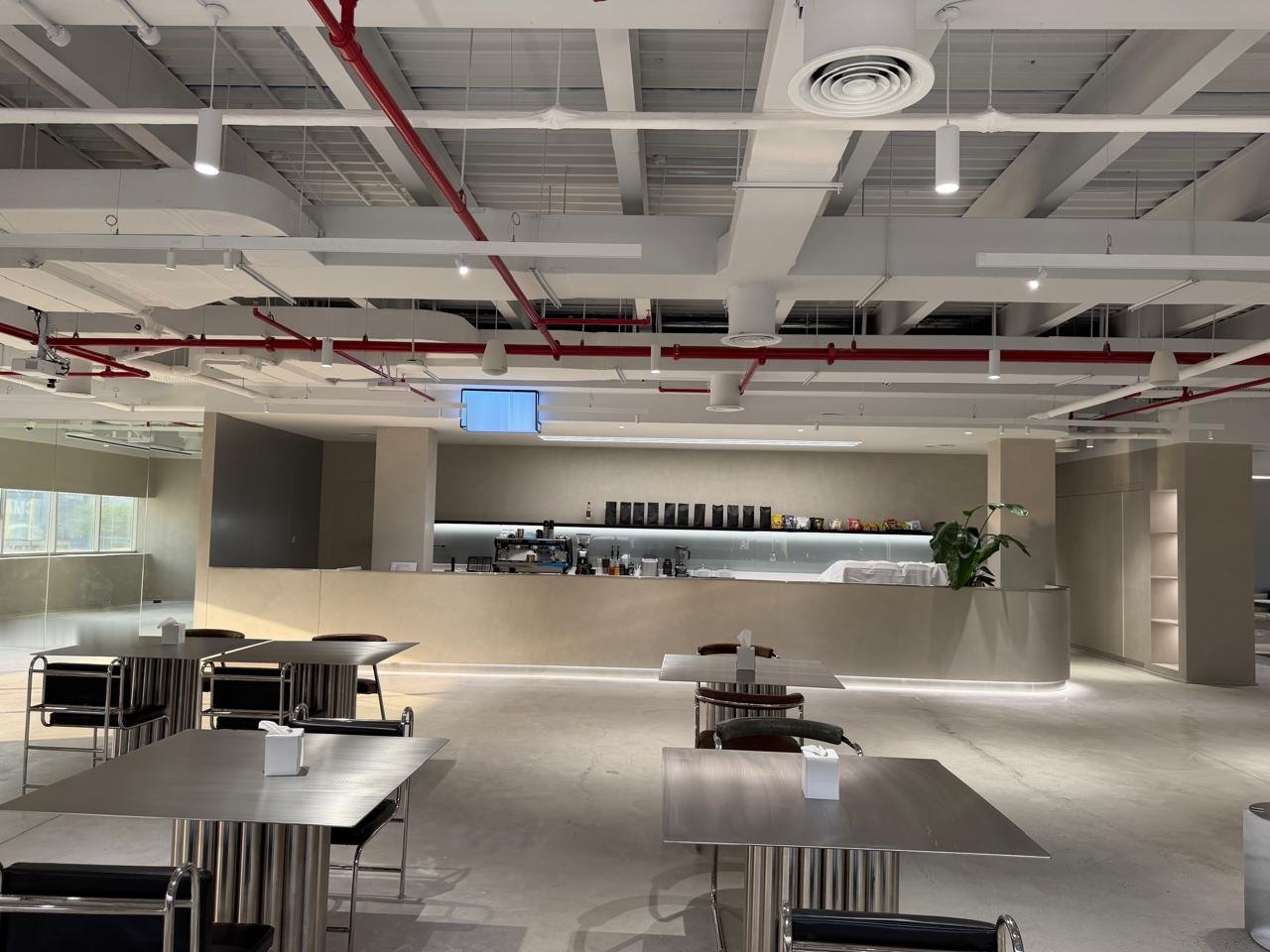 Open-ceiling café and coffee bar, creative studio, JAFZA