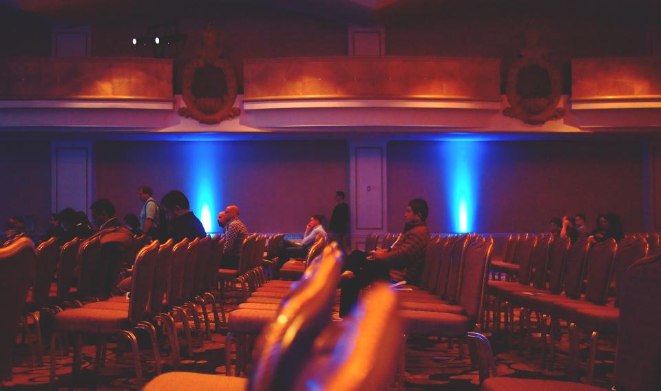 A conference auditorium during a session — AI & Digital Health