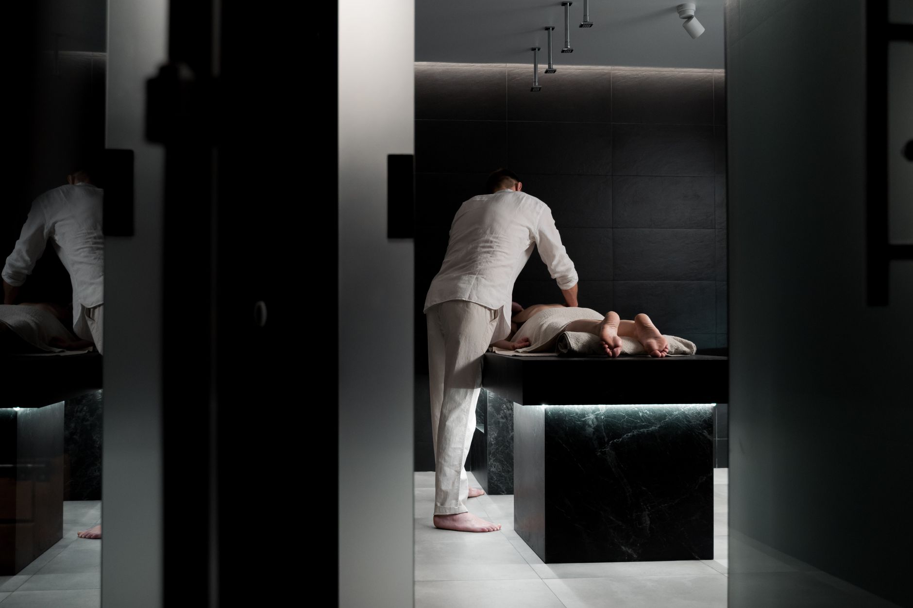 A relaxing massage in a modern spa room promoting wellness and self-care — Longevity Tourism & Wellness
