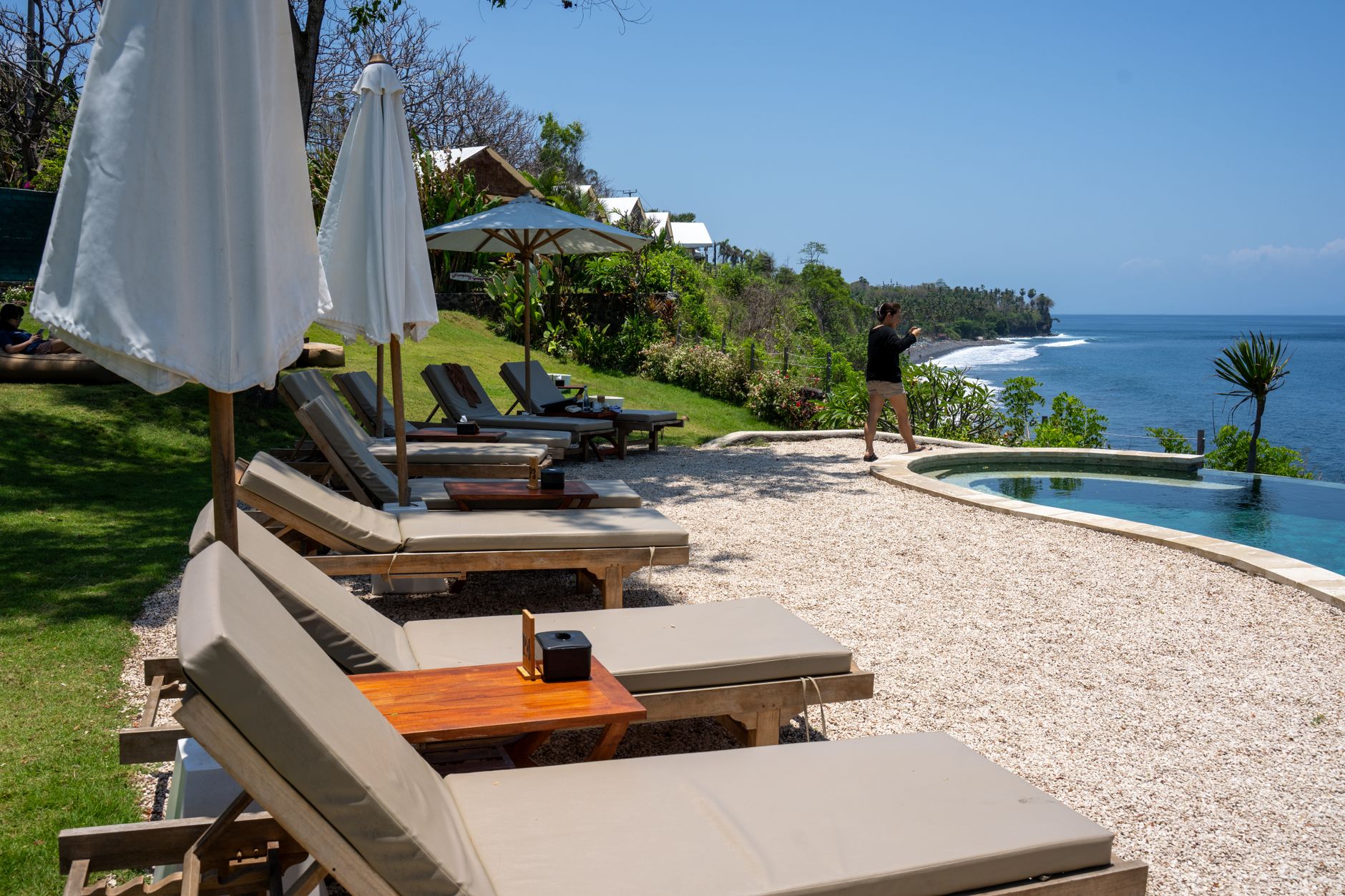 A resort pool overlooking the ocean — Longevity Tourism & Wellness