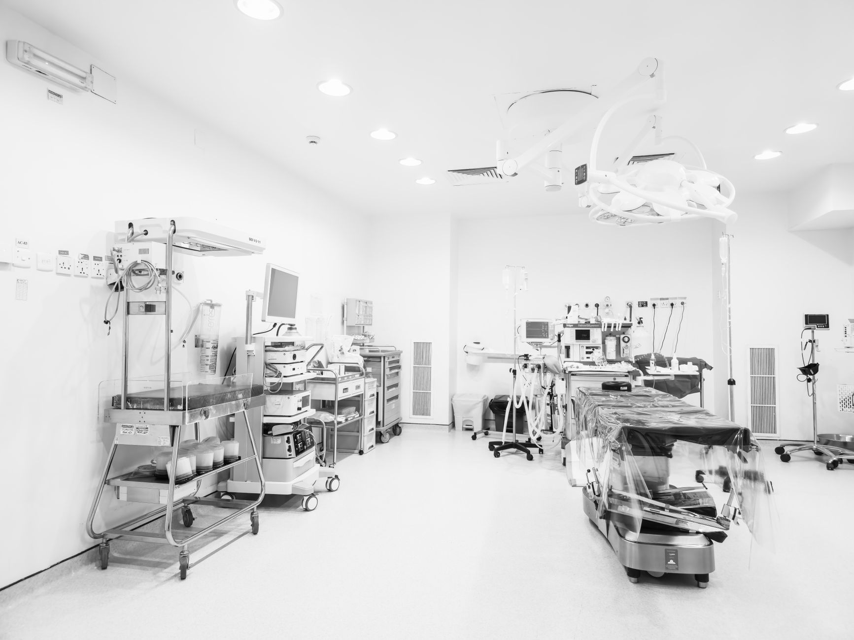 A modern operating room with advanced equipment in a bright, sterile environment — Healthcare Infrastructure