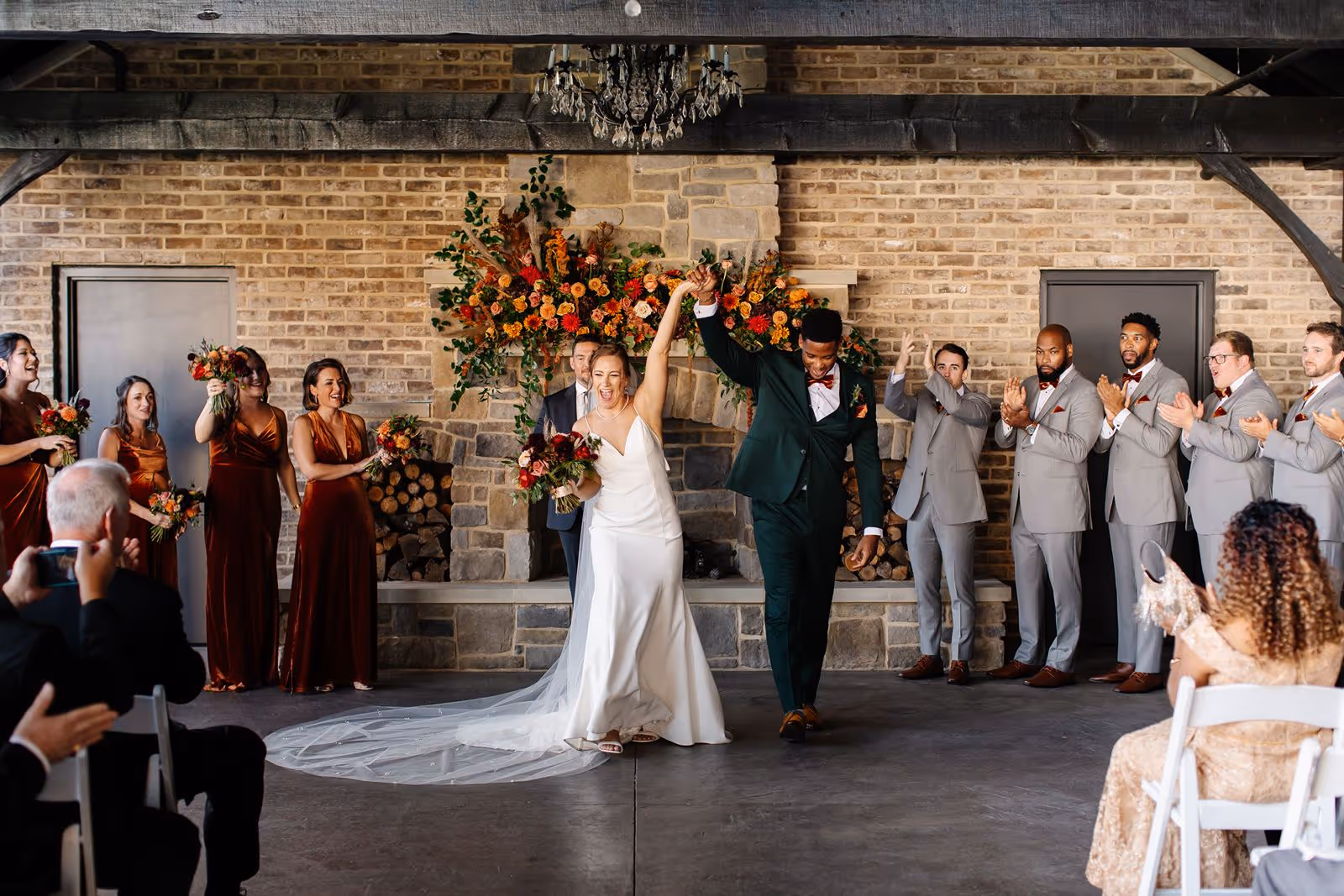 A bride and groom celebrate their small wedding at our outdoor garden venue.