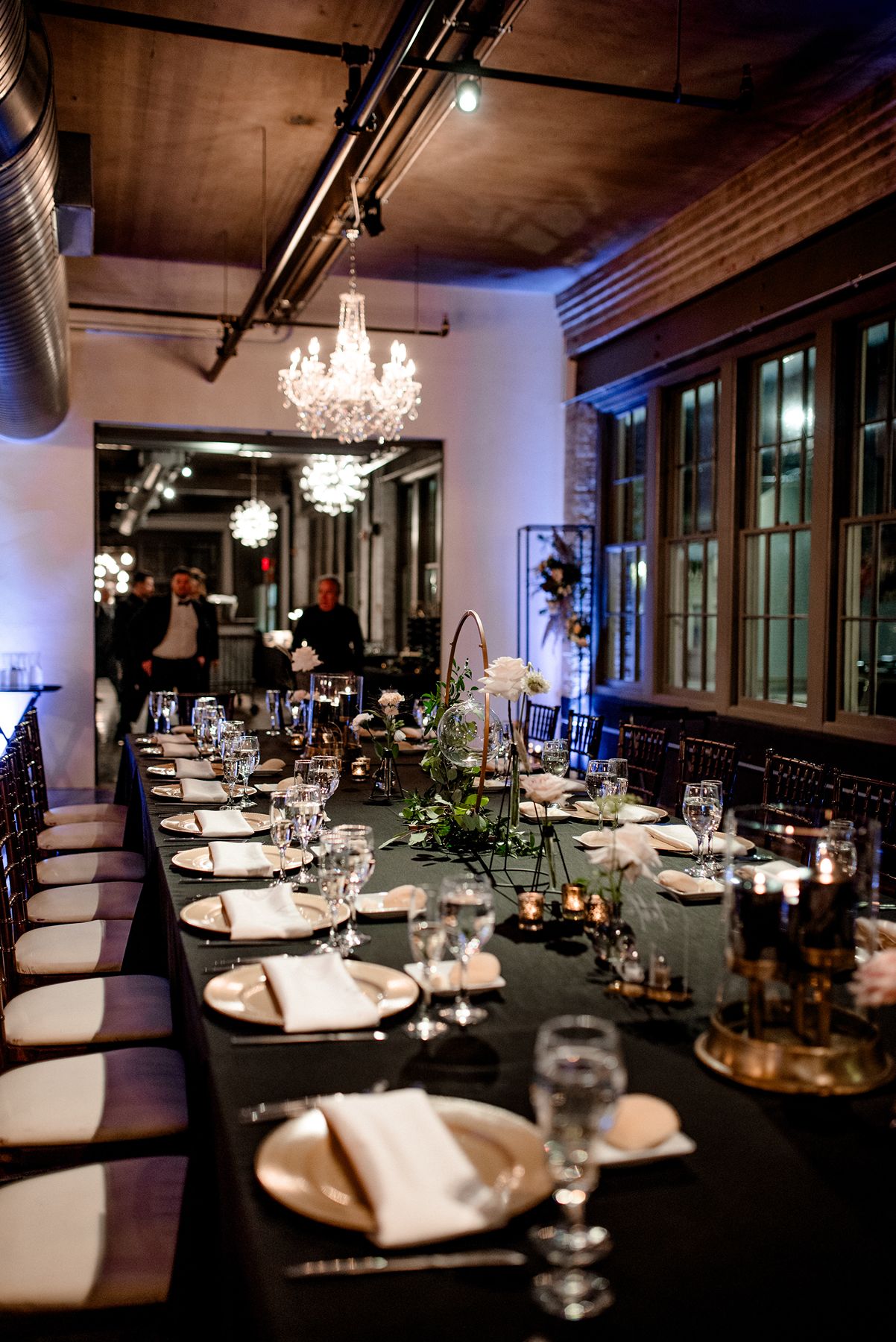 A bride and groom celebrate their small wedding at our outdoor garden venue.