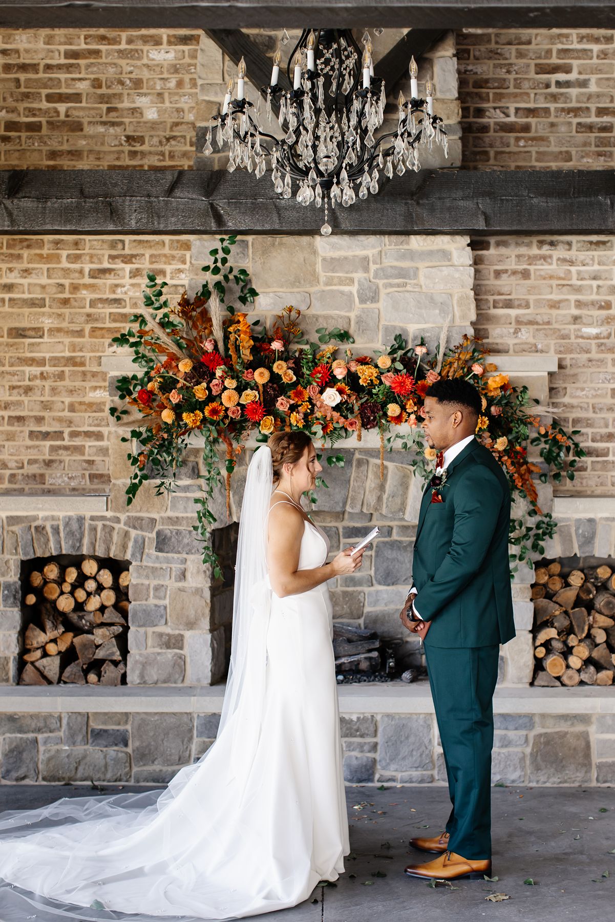 Bride and groom cutting their wedding cake during an intimate micro wedding reception at The Bond in downtown York, PA.