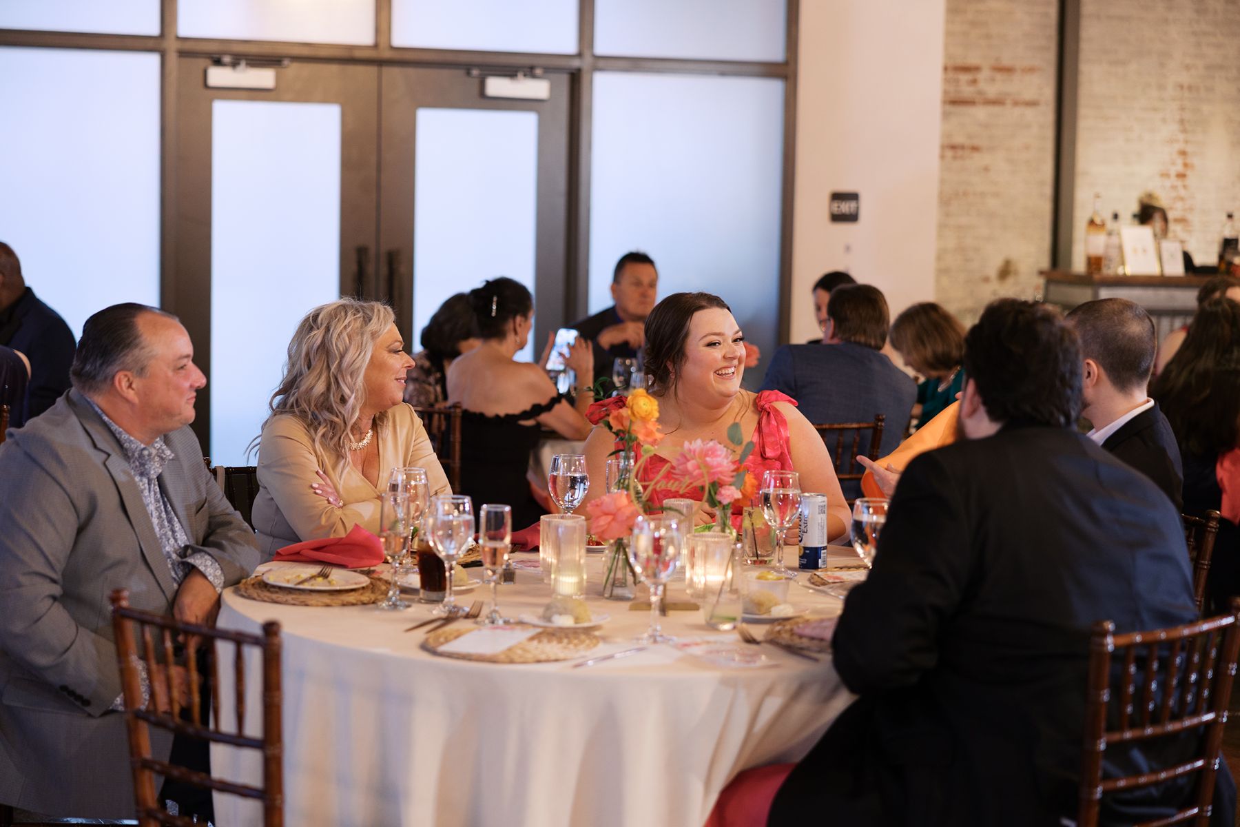 A bride and groom celebrate their small wedding at our outdoor garden venue.