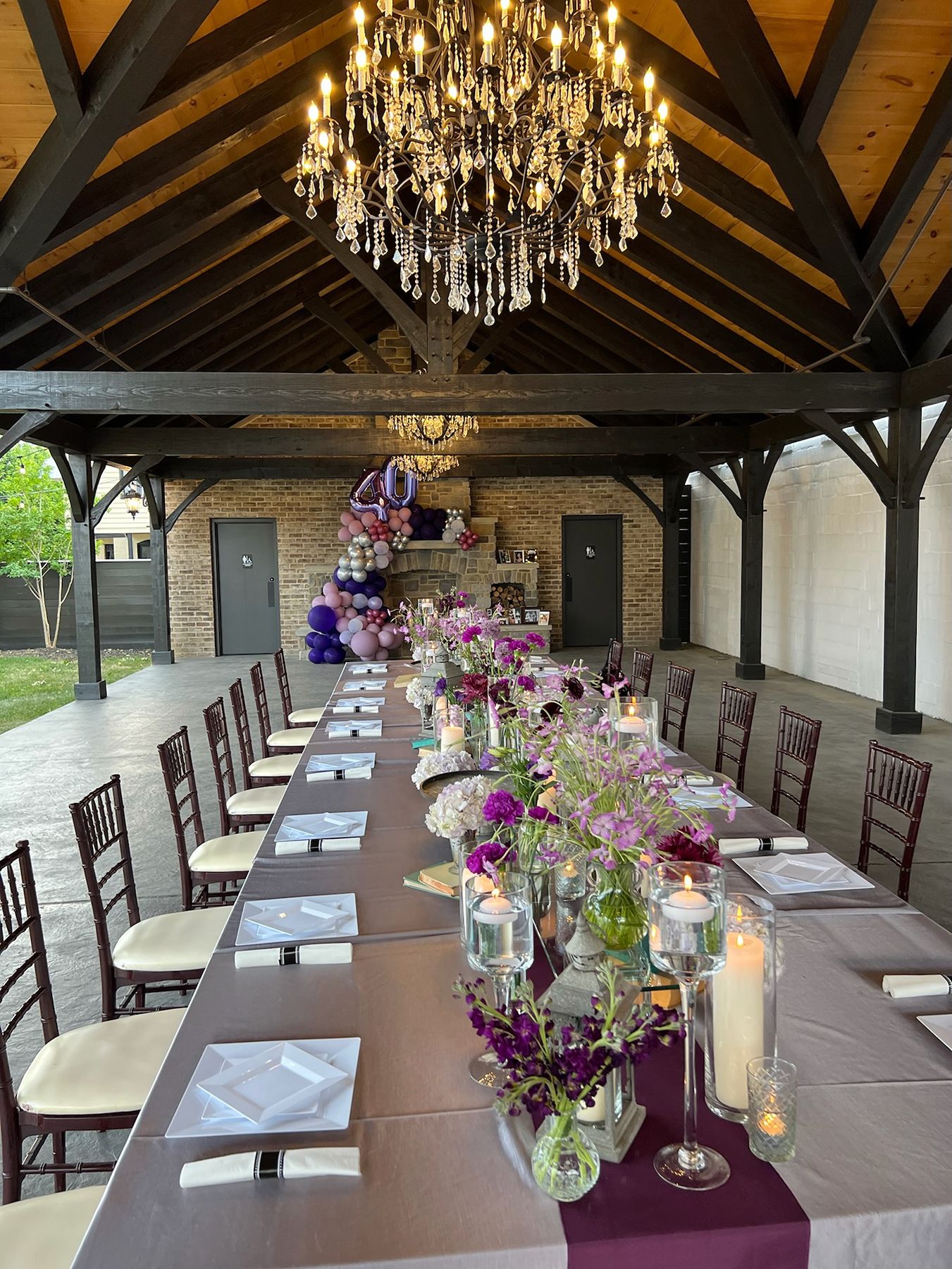 Long table private dinner event setup inside The Garden Pavilion in York, Pennsylvania