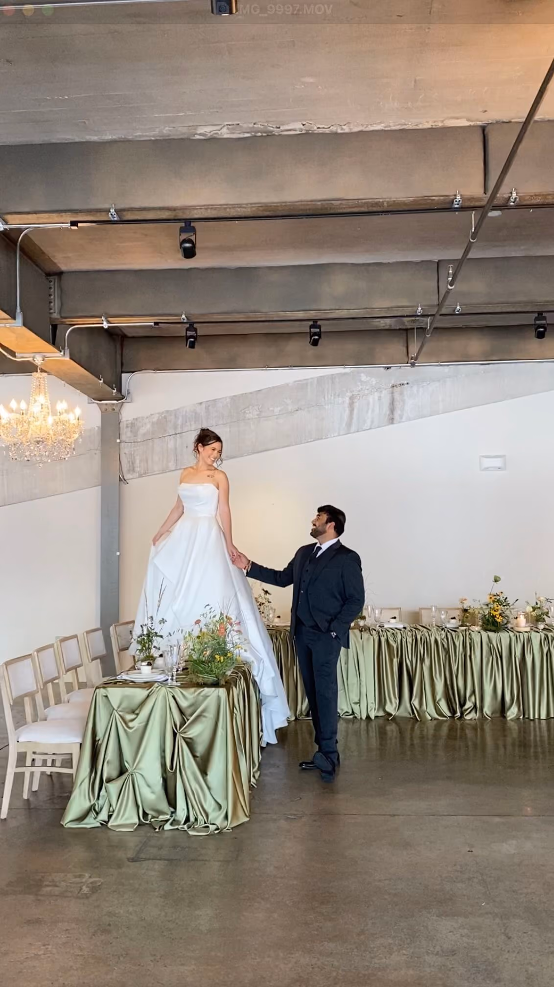 Couple posing together on a downtown street near The Bond Events, showcasing a modern micro wedding in York, Pennsylvania.