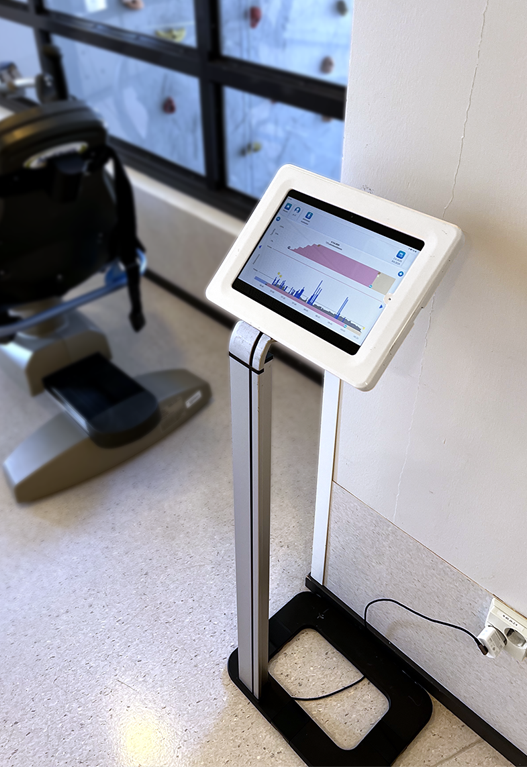 [interface] image of ai software on a tablet with hospital setting background (for an ai healthcare company)