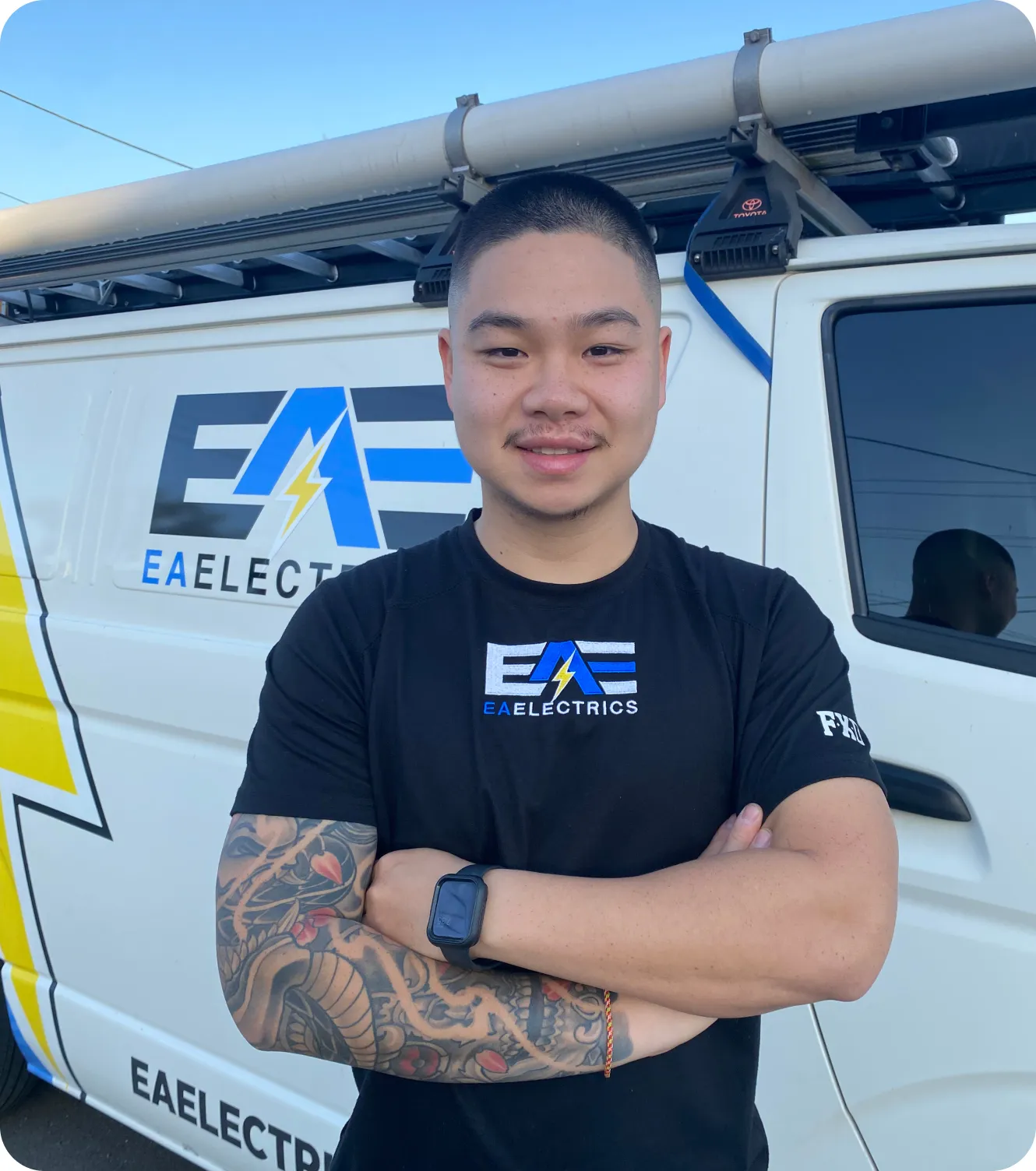 Image of Patrick standing beside his van