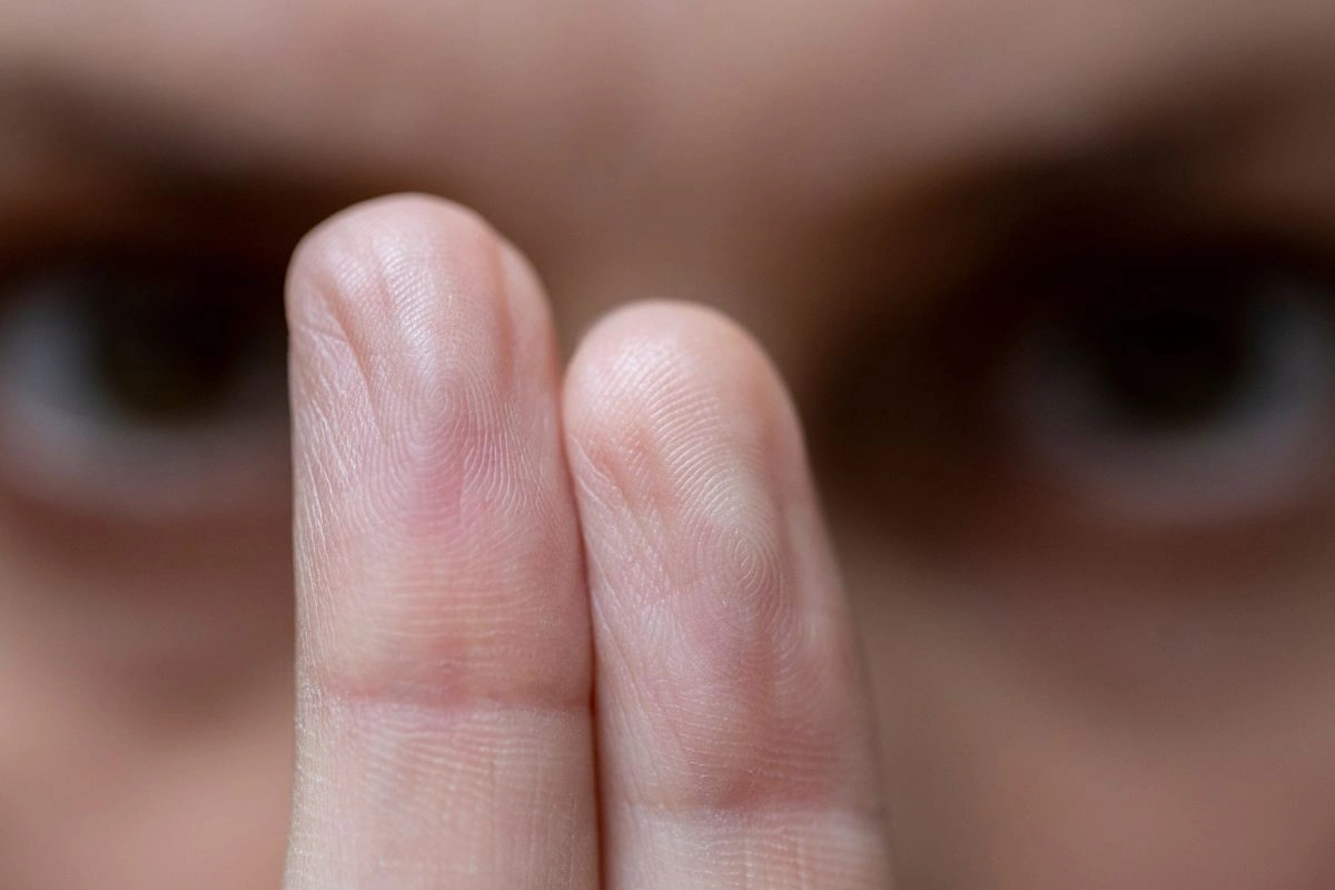 Photo of two eyes looking at two fingers - the technique used in EMDR therapies