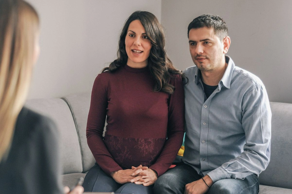 A couple having parenting support session with a therapist