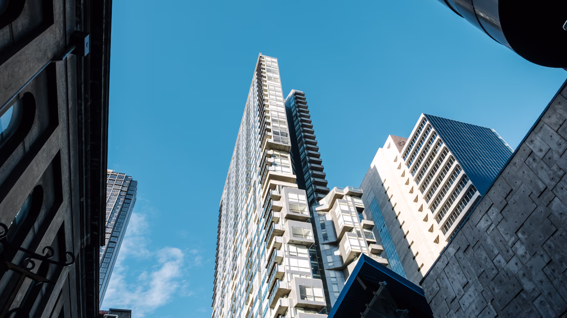 skyscraper building from street perspective.