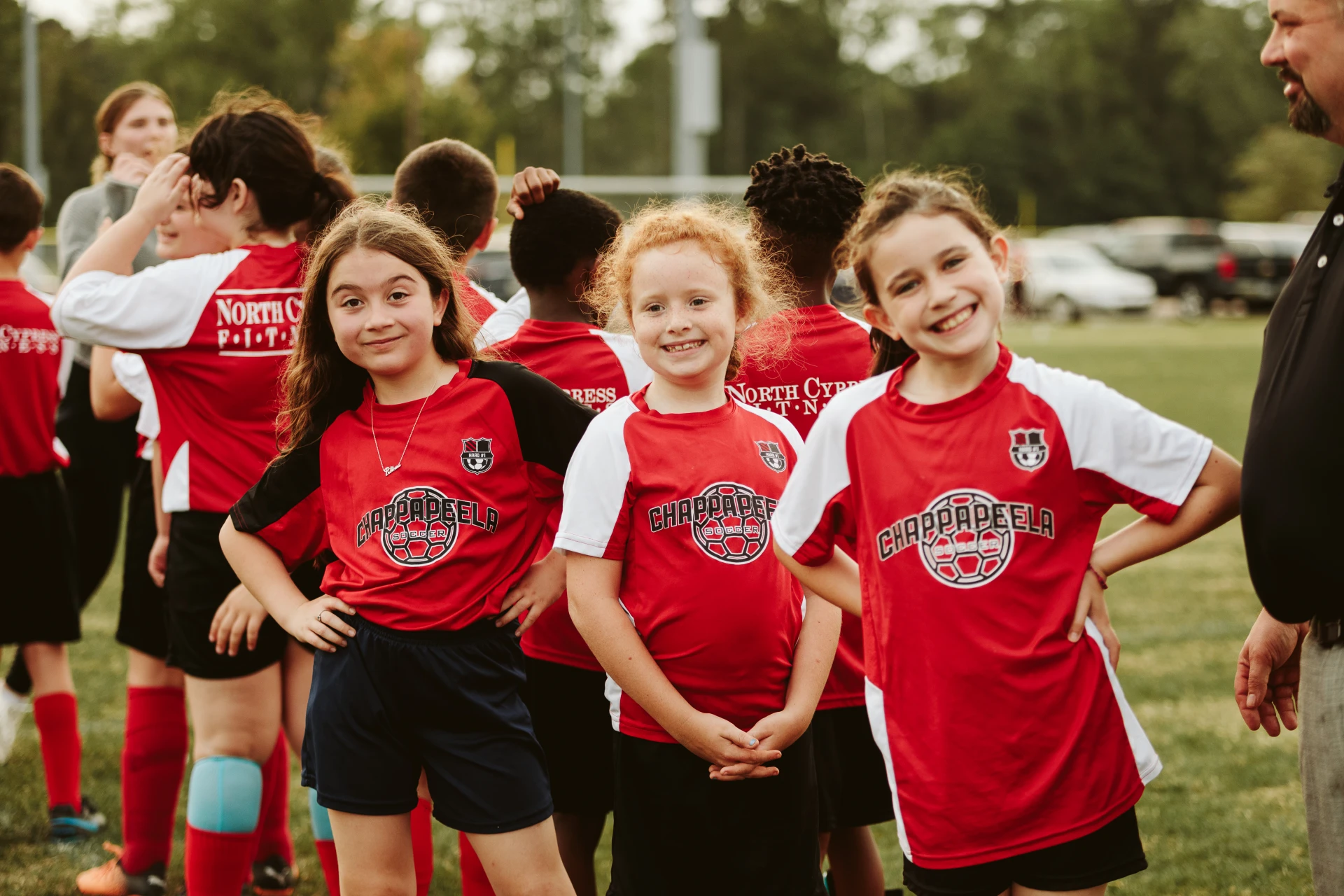 Girls smiling playing sports