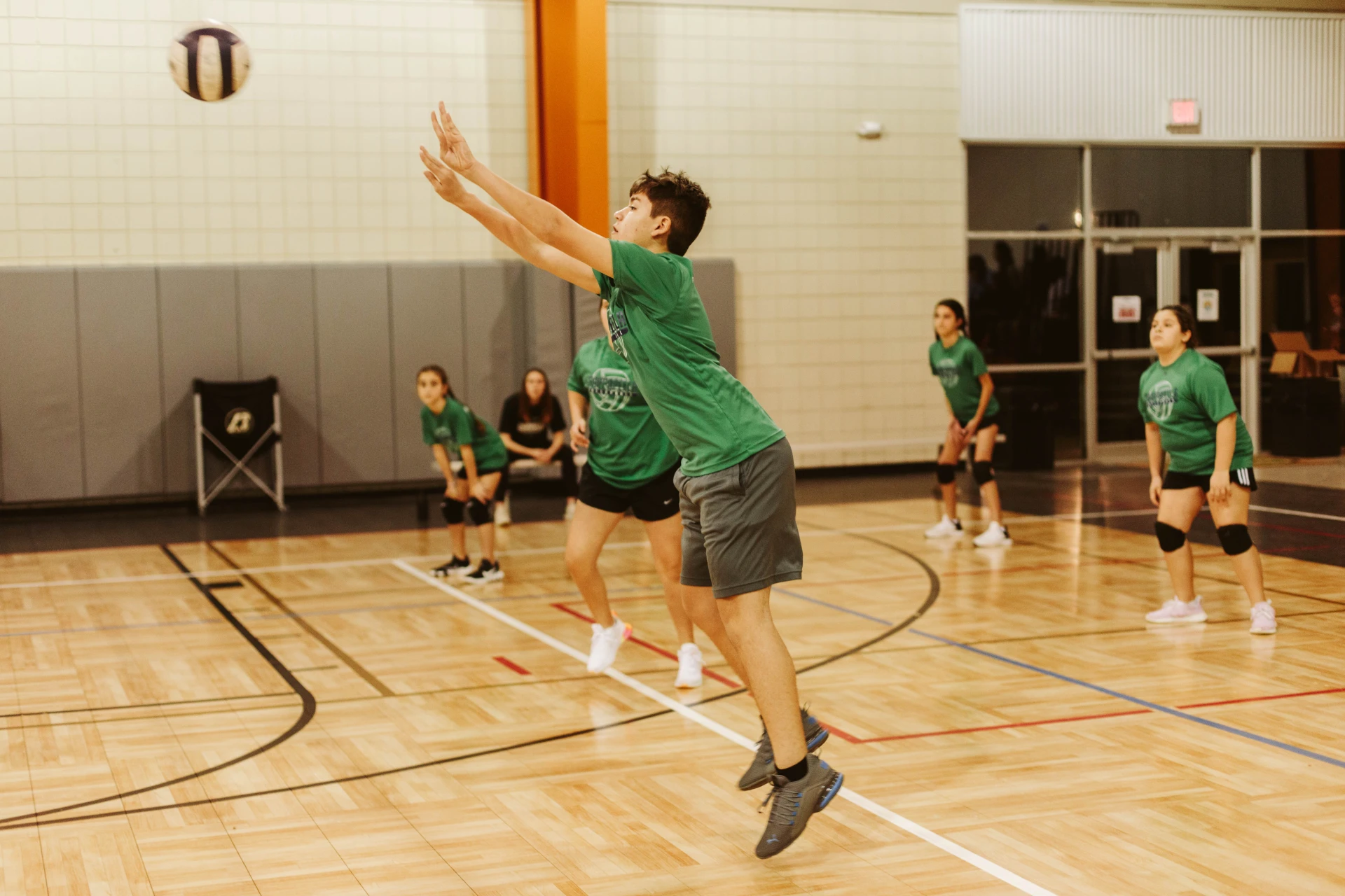 Kid playing volleyball