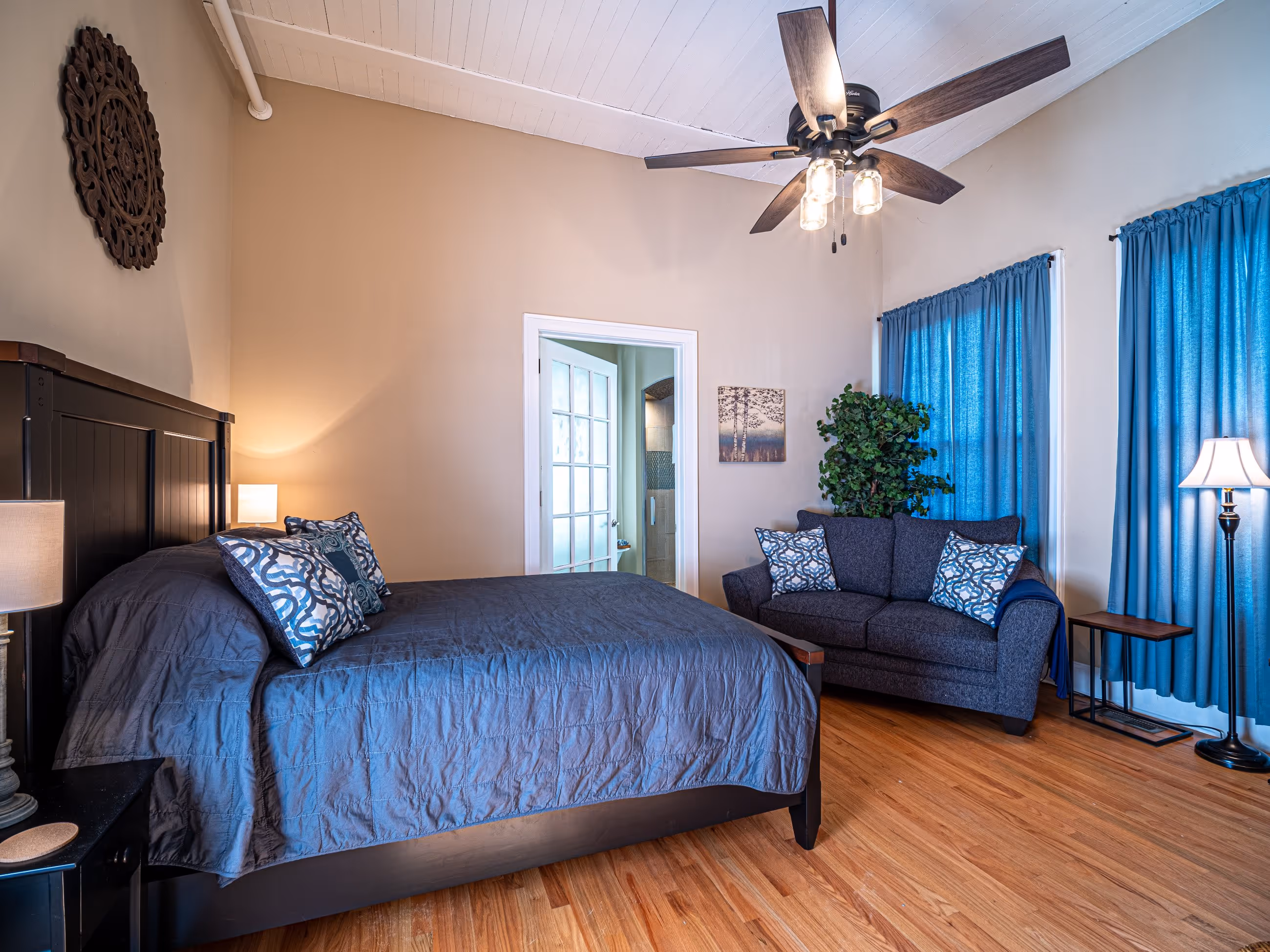 Spacious bedroom with hardwood floors at Victorian Village Apartments in Marietta GA