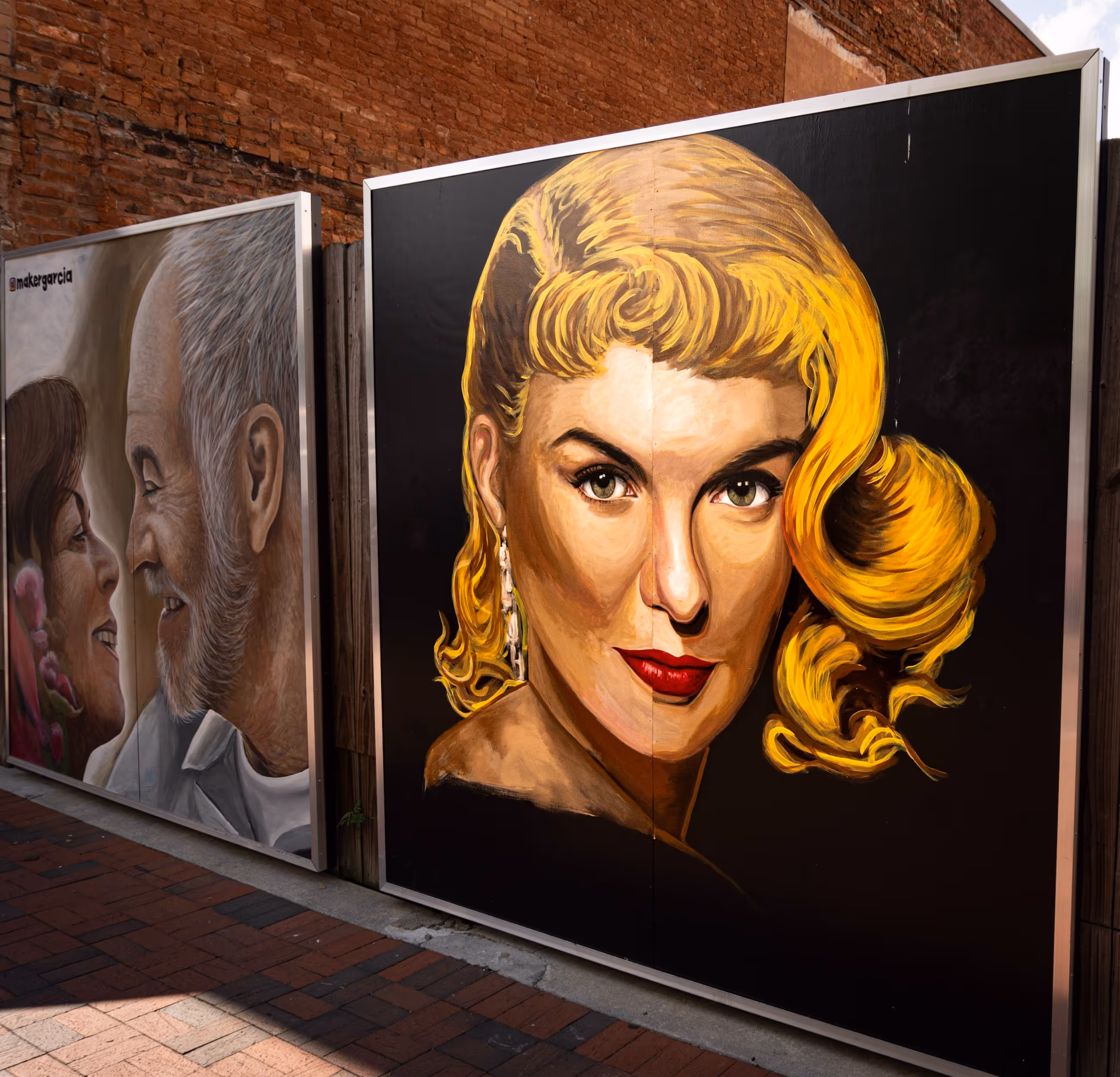 Historic street art mural of a woman's portrait in downtown Marietta GA near Victorian Village Apartments