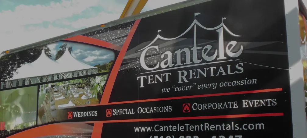 Promotional trailer wrap for Cantele Tent Rentals, showcasing images of event setups and tent services.
