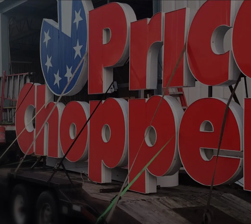 Large red Price Chopper illuminated sign being prepared for installation at Saxton Signs facility