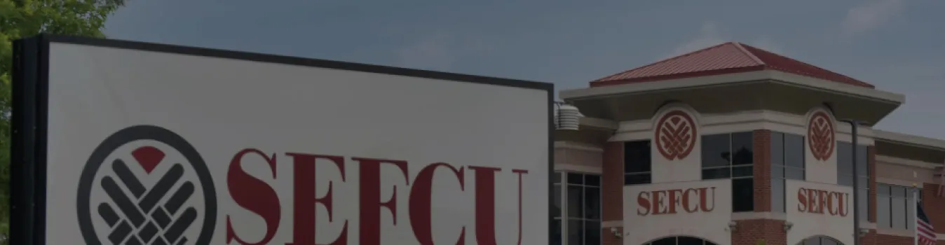 SEFCU credit union headquarters with branded signage on both monument and building facade