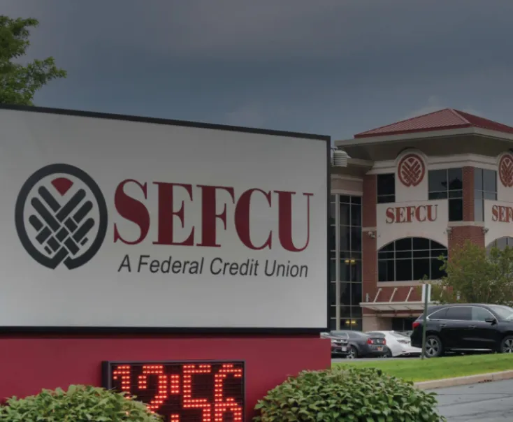 Exterior signage and headquarters of SEFCU, a Federal Credit Union with custom branding