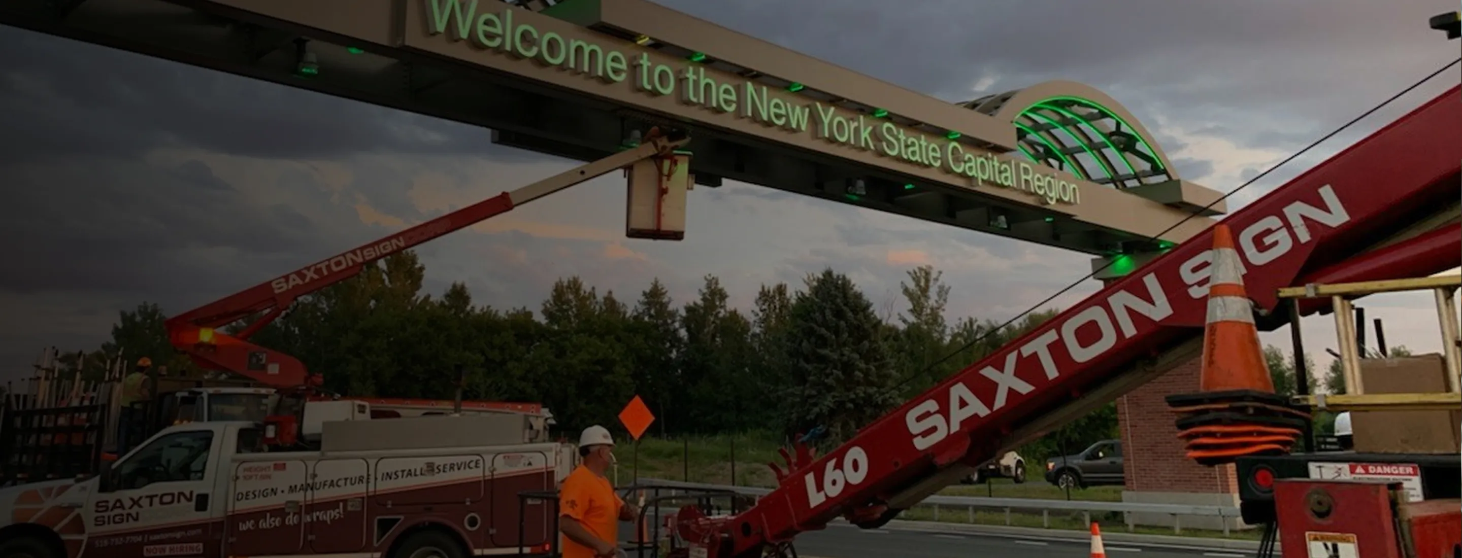 Crane installing welcome sign in New York