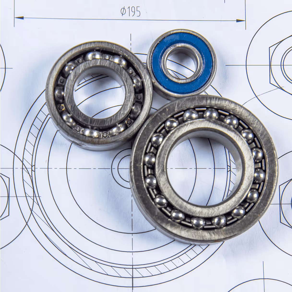 Three ball bearings on a technical drawing.