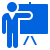 A blue icon of a person pointing to a presentation board.