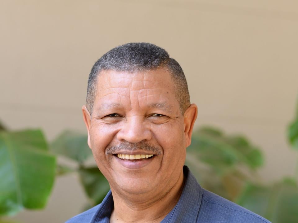 Missionary in New Zealand sharing the Gospel amidst lush nature and community. OM New Zealand