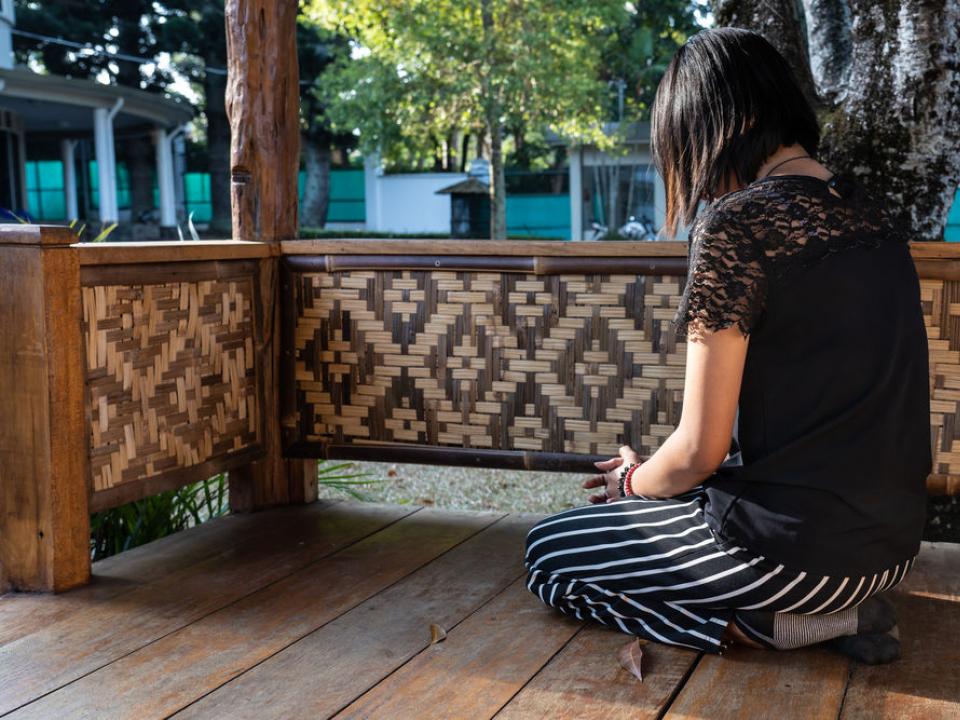 Christians from New Zealand relax outdoors amidst a beautiful outdoor mission setting. OM New Zealand
