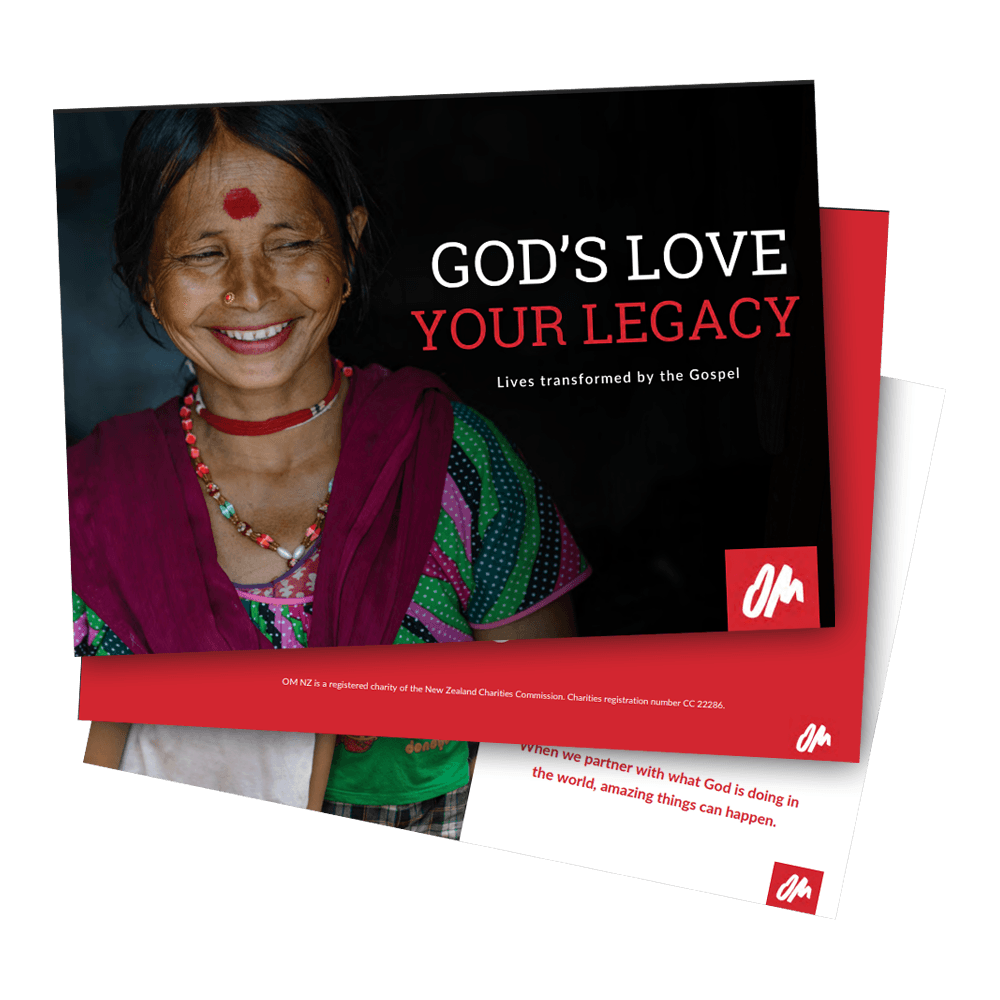 Woman with Gospel message face paint promoting OM New Zealand's global mission work. OM New Zealand