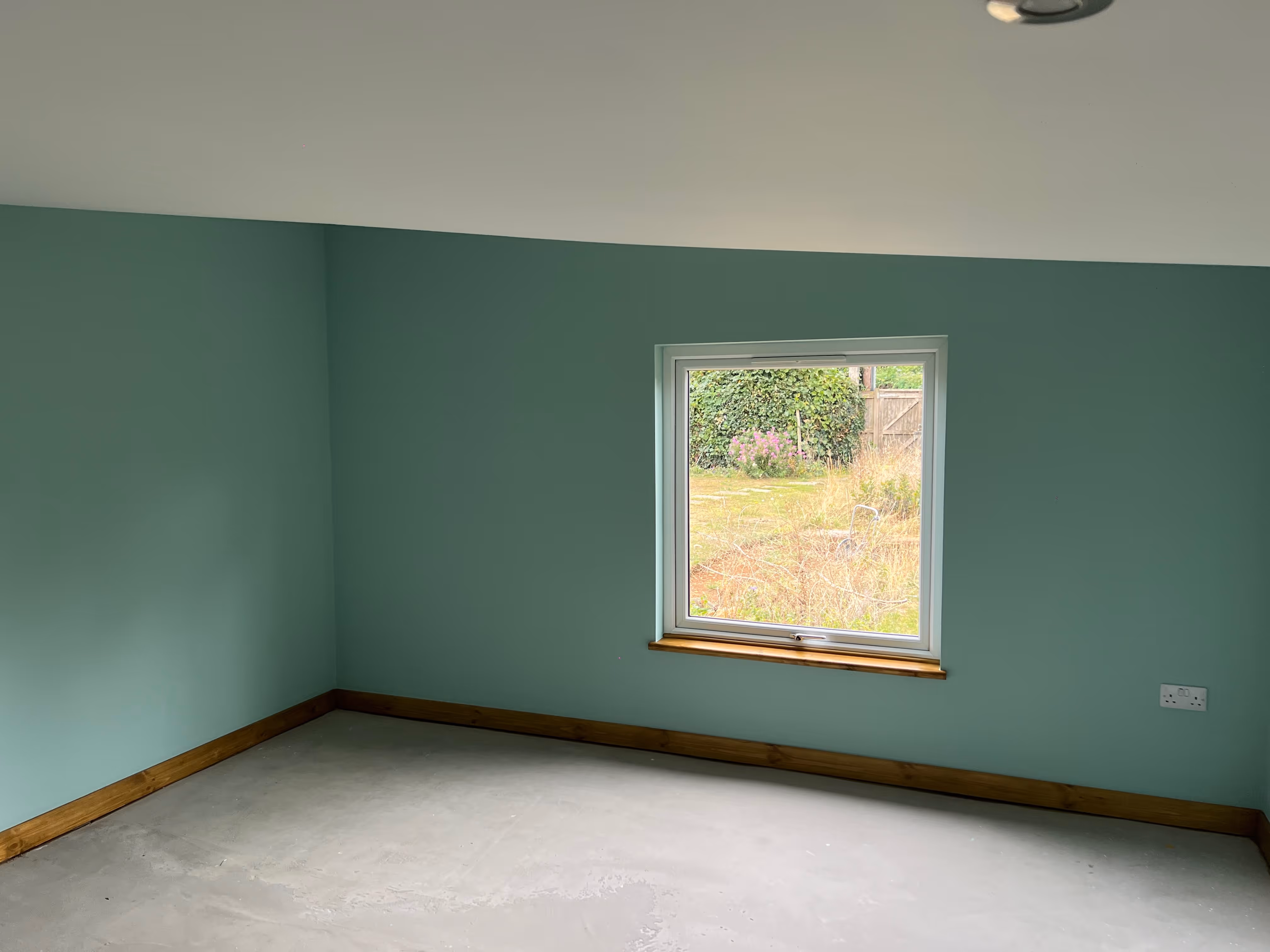 Timber frame with freshly plastered interior