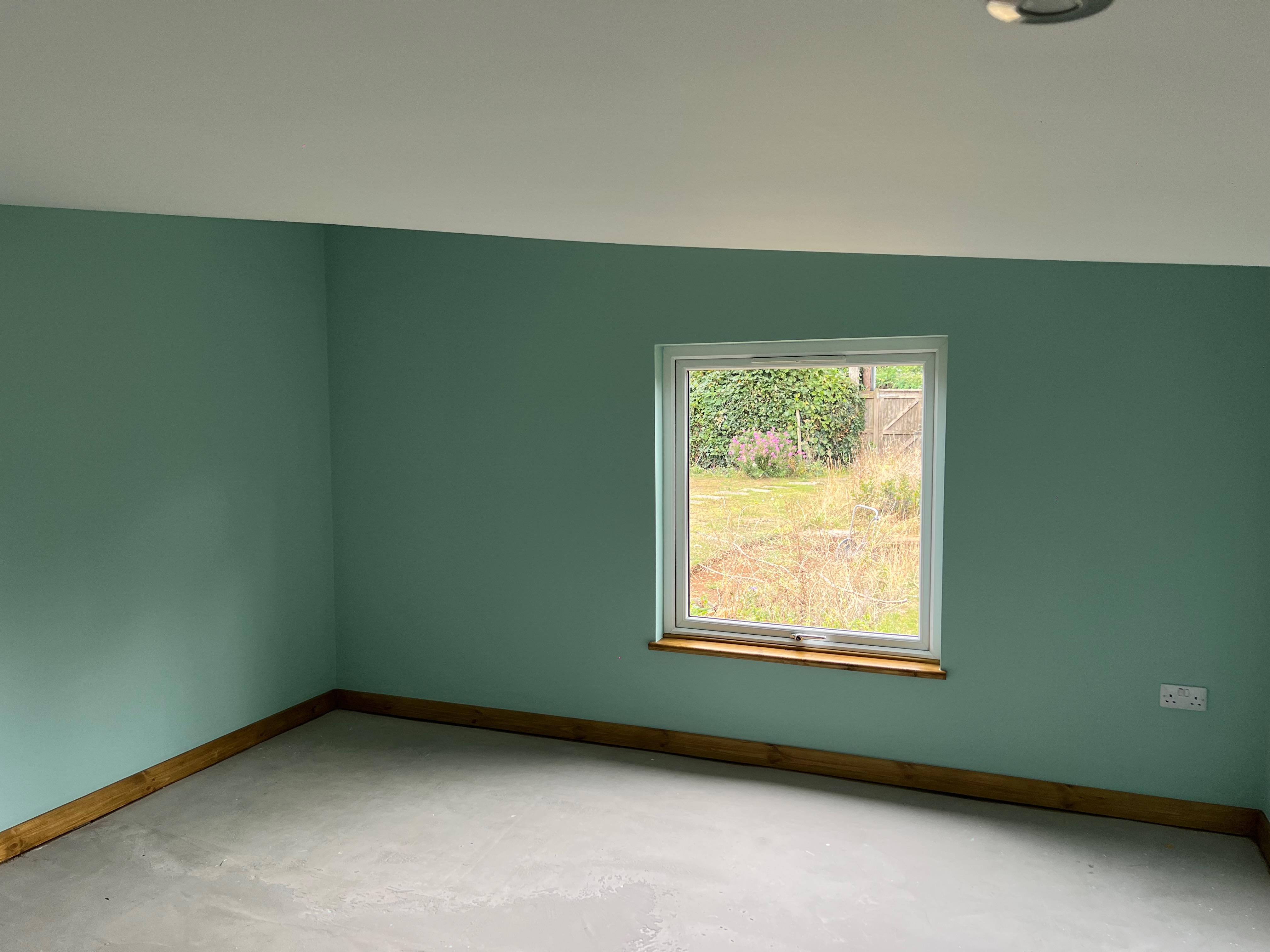 Timber frame with freshly plastered interior