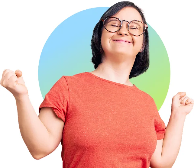 Smiling woman with Down's Syndrome looking overjoyed and holding arms up