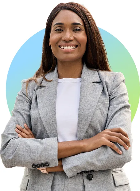 Confident smiling woman wearing business blazer and crossing arms