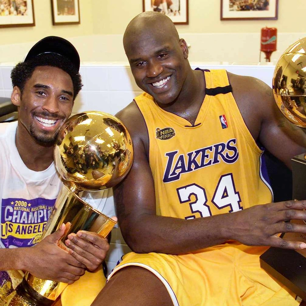 Shaquille O'Neal and Kobe Bryant with Trophies