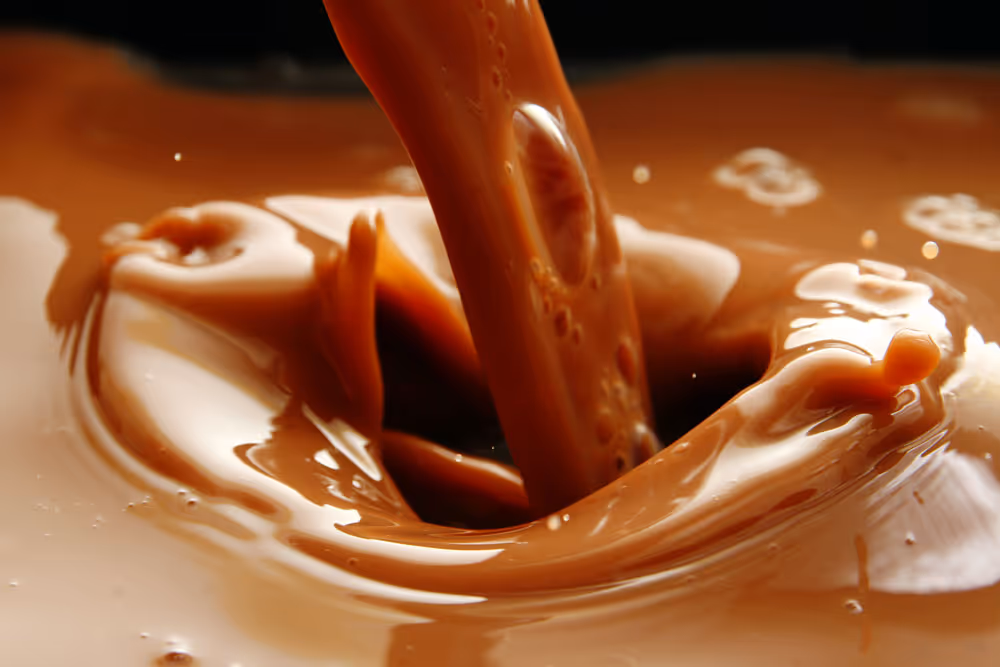 Chocolate milk being poured