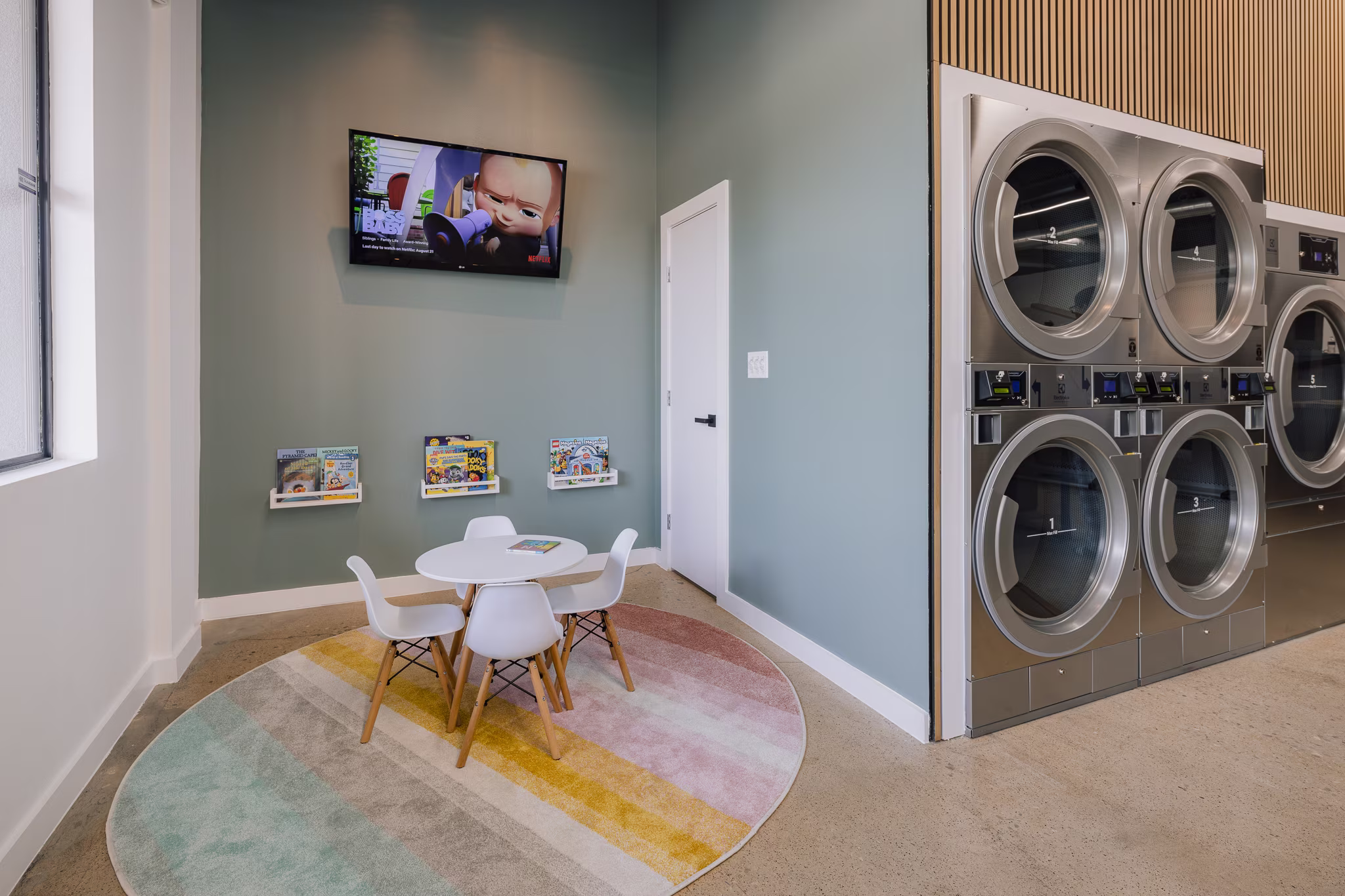 The Wash laundromat in Richardson TX offers a dedicated play area to keep kids occupied while their grownups are doing laundry