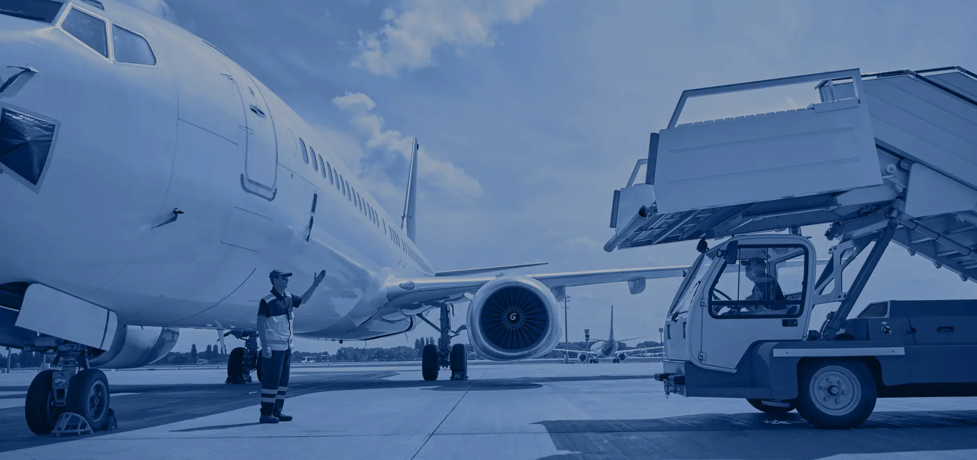 airplane being boarded with freight