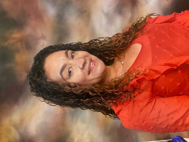 Ms. Mulero smiling in a professional staff portrait photo