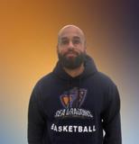 Mr. Tavarez wearing a basketball hoodie