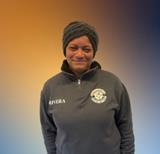 Ms. Rivera smiling in school staff photo