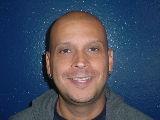 Mr. Alicea smiling in staff directory photo