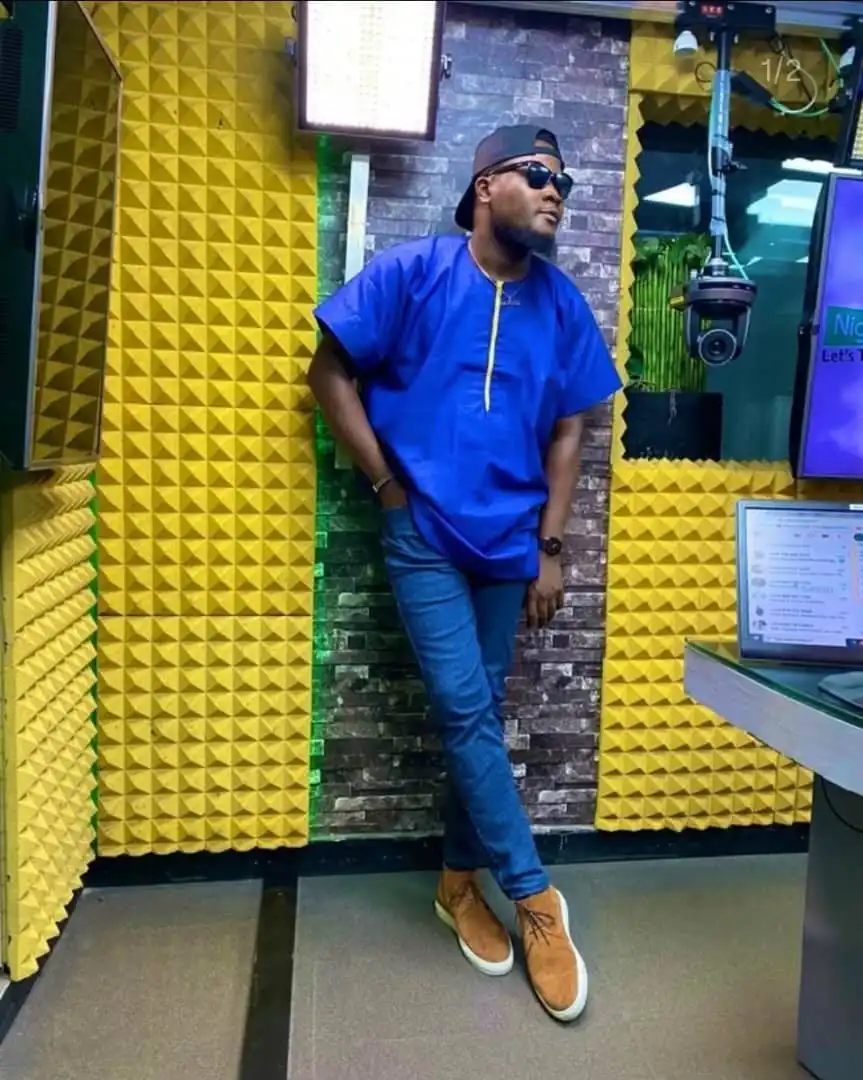 Anthony Devoyce wearing Jeans in a Studio