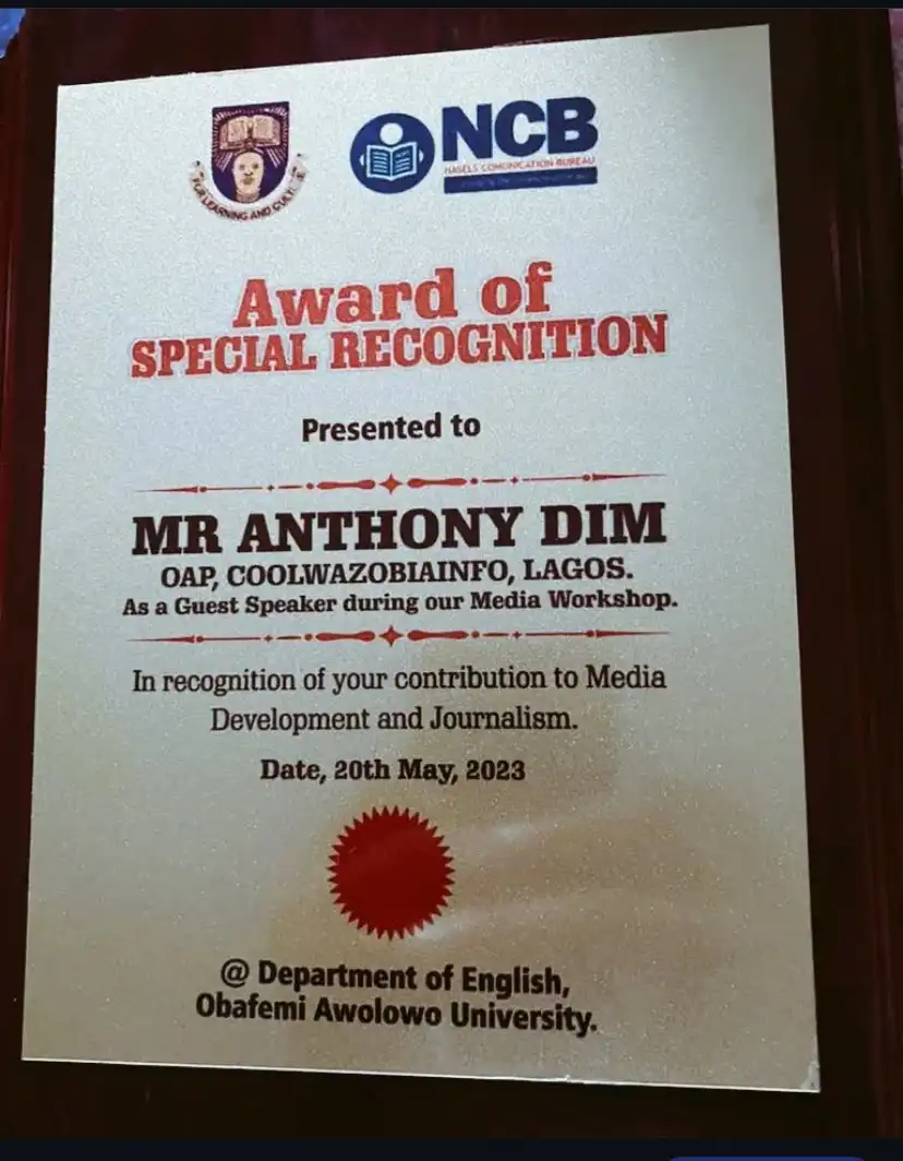 Award presented to Anthony by OAU