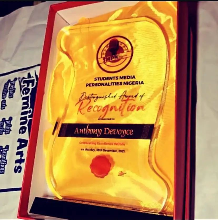 An Award presented to Anthony Devoyce by UCJ