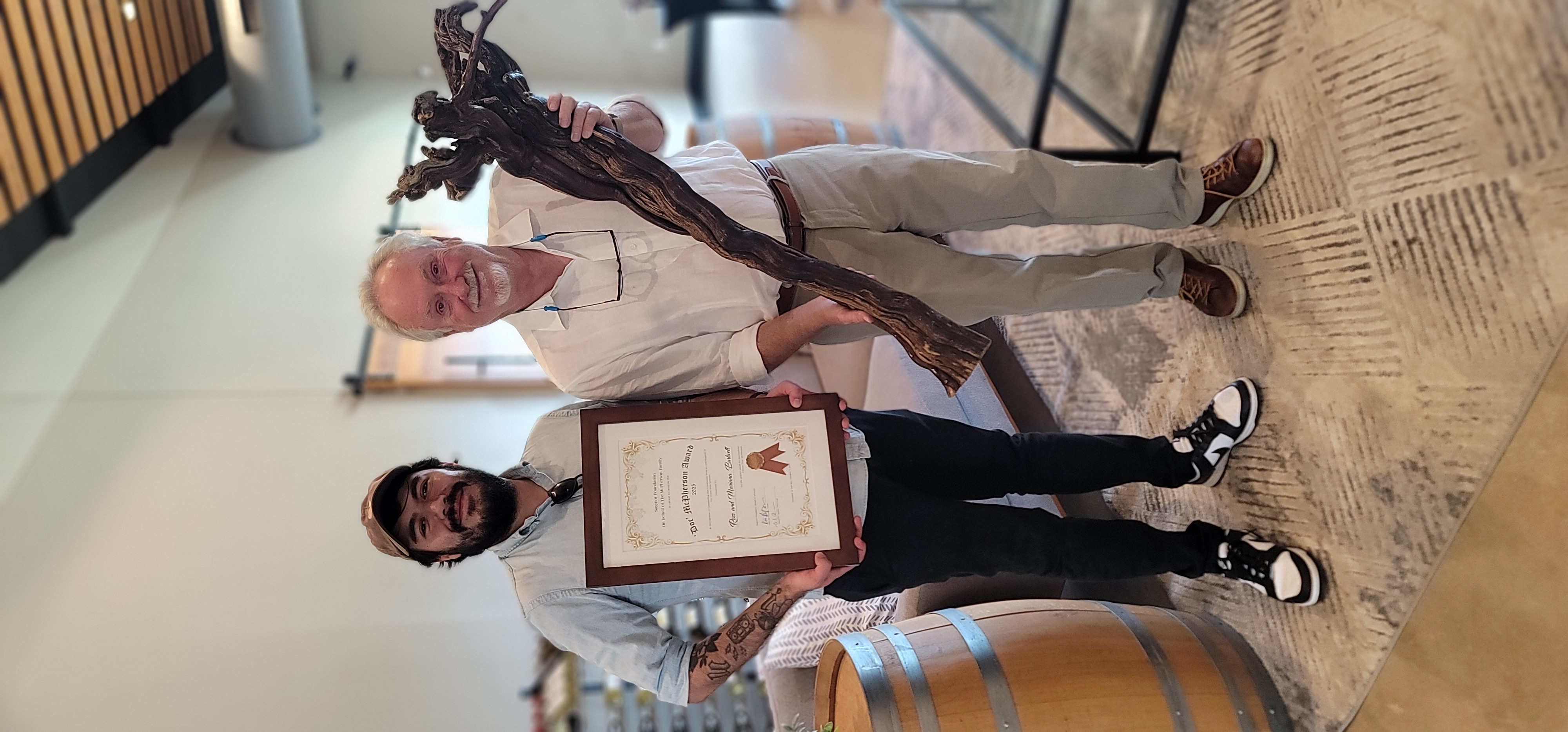 KIm McPherson presnting to Hunter Burtwell