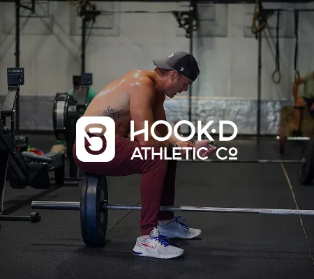 a man lifting weights in Hook'd CrossFit gym 