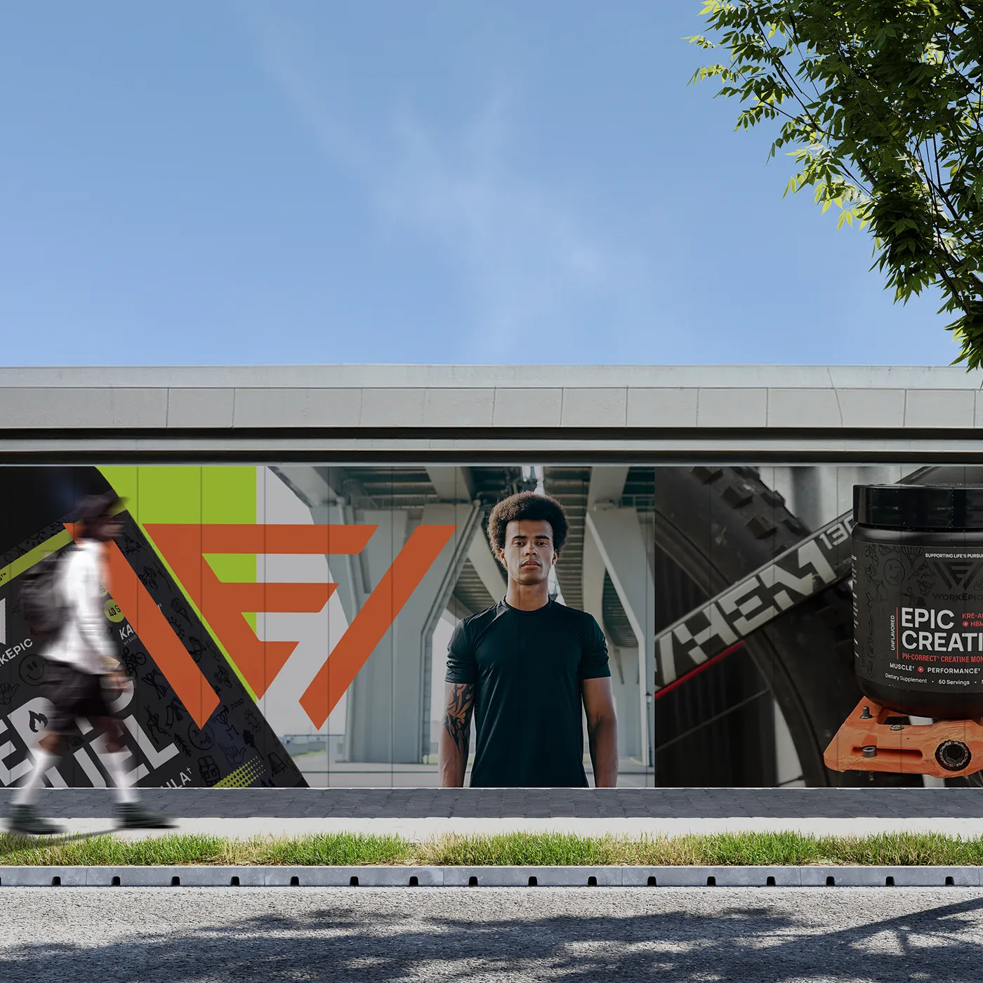 a man walking past a building with a poster on the side for WorkEpic
