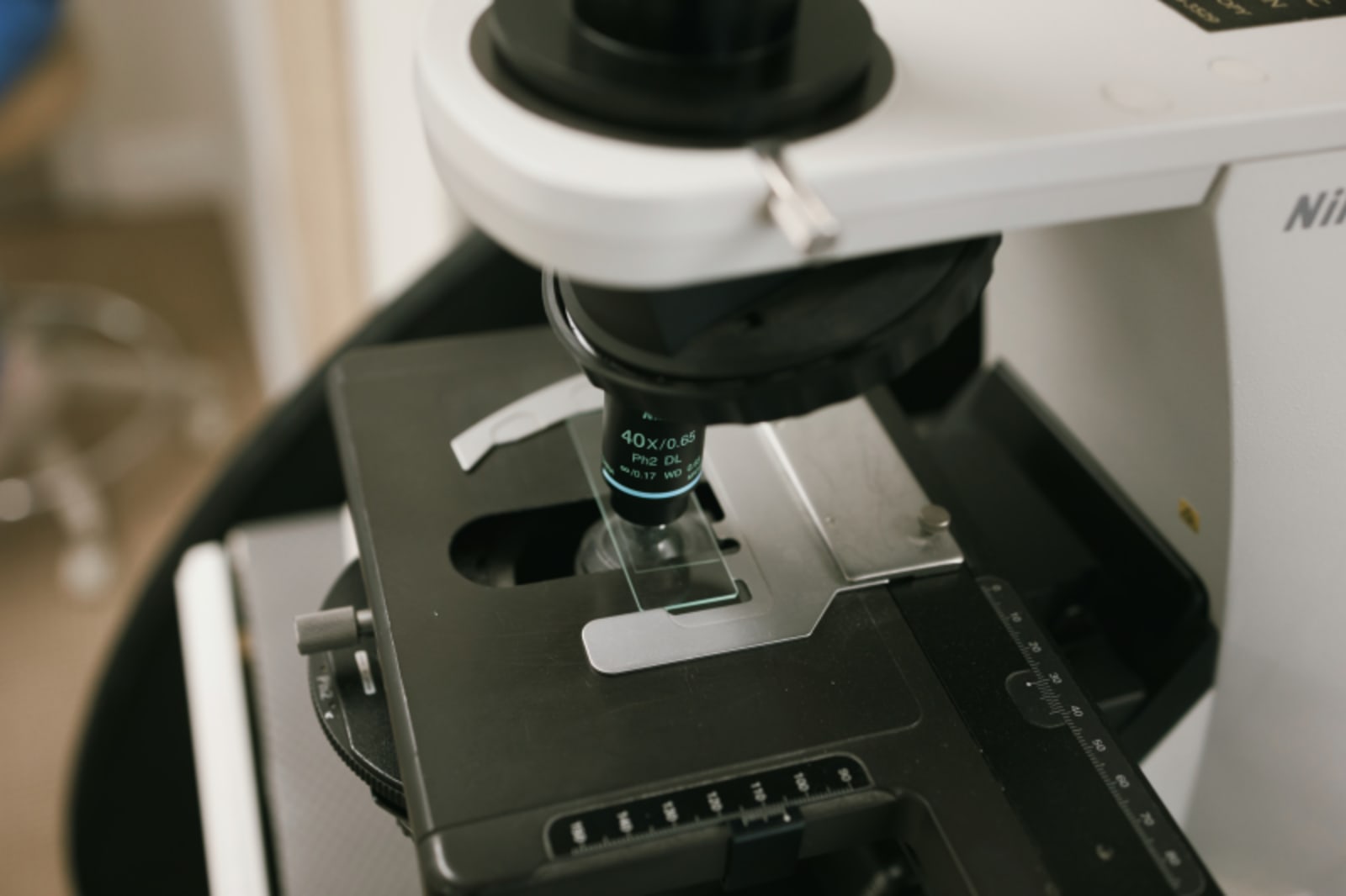 Close-up of dental microscope equipment in clinical setting