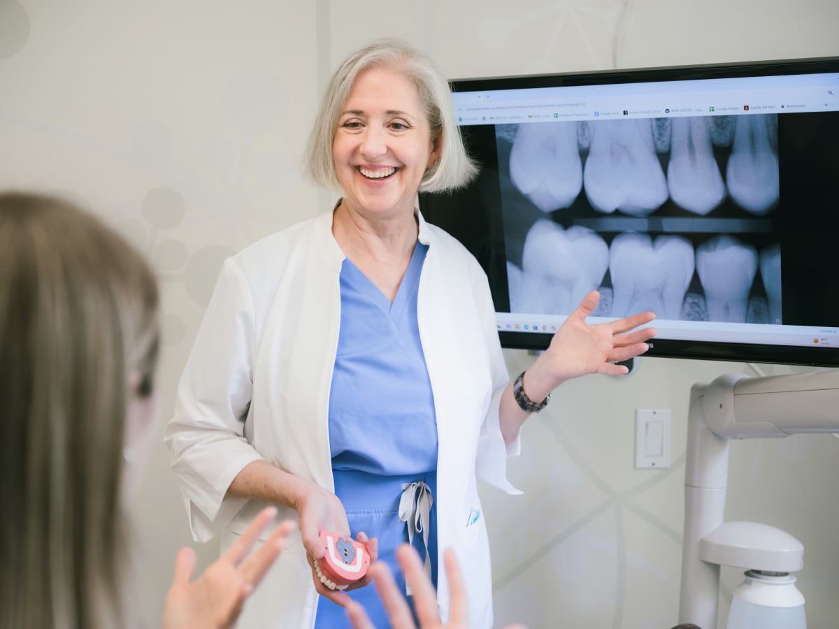 Metal-free ceramic zirconia dental implants displayed in modern Santa Barbara dental office setting